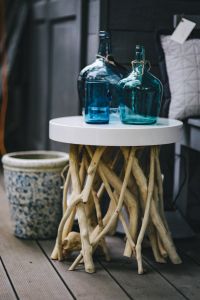 Kaboompics - Cyan decorational bottles on a wooden stool