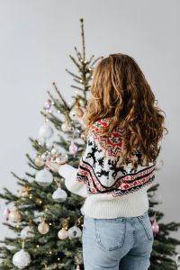 Kaboompics - Woman Decorate Christmas Trees