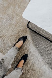 Kaboompics - Woman wearing grey jeans & black leather high heels