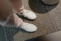 Kaboompics - A woman in white flatform sneakers