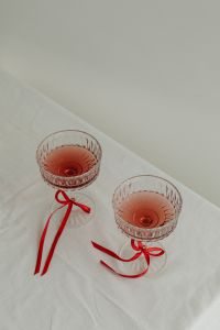 Elegant Toast - Vintage Wine Glasses with Red Ribbon Accents