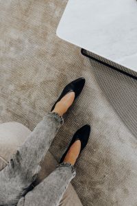 Kaboompics - Woman wearing grey jeans & black leather high heels