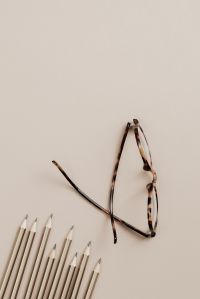Copy space - pencils - glasses - flat lay