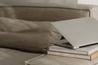 Kaboompics - Home office on the sofa - books - laptop - MacBook