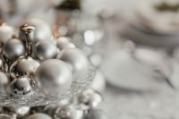 Kaboompics - Silver balls on a glass stand on the table