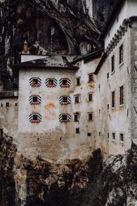 Kaboompics - Predjama castle at the cave mouth in Postojna, Slovenia
