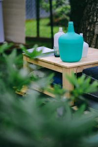 Kaboompics - Jars on a wooden garden table