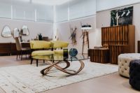Kaboompics - Luxury livingroom interior with table, chairs, commode, poufs, rug