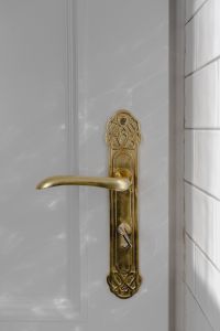 Kaboompics - Antique gold plated door handle