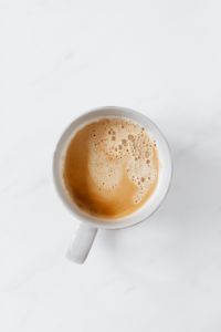 Kaboompics - A cup of coffee on white marble
