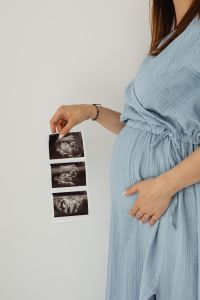 Kaboompics - Young Pregnant Woman With Ultrasound Photos