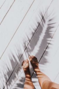 Kaboompics - Woman's legs with palm shadow