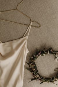 Kaboompics - Satin wedding dress - head garland of fresh flowers