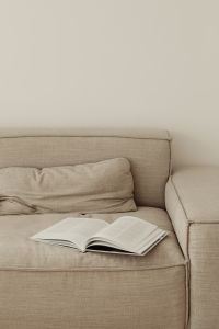 Kaboompics - Open book on the couch - magazine