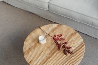Kaboompics - Wooden coffee table - rug - living room - candle