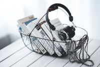 Headphones with a basket of books
