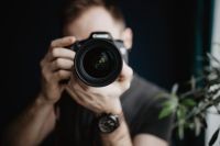 Kaboompics - Young man taking photos