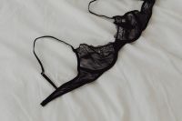 Kaboompics - Black lace underwire bra - white sheets on the bed