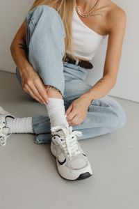 Kaboompics - Sneakers shoes - long white striped socks