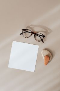 Kaboompics - Blank card & rock-glasses on beige background