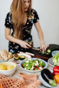 Kaboompics - Teen Girl makes a salad