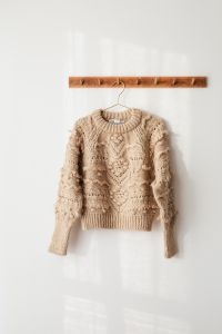Kaboompics - Sweater on hanger