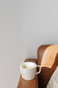 Kaboompics - A cup of coffee and a leather sofa
