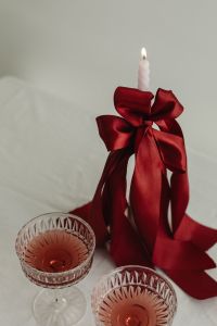 Kaboompics - The romance of ribbons - Bow Candle Holder - Glasses with wine