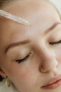 Kaboompics - Applying Facial Serum for Enhanced Skin Care
