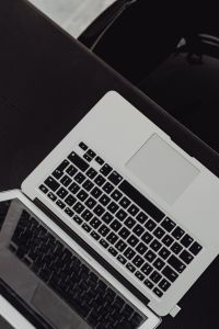 Kaboompics - Stylish workspace with MacBook computer on home or studio