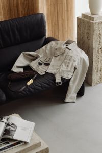 Kaboompics - De Sede DS-2011 Black Leather Two Leather Sofa - Travertine Furniture - White Leather Jacket