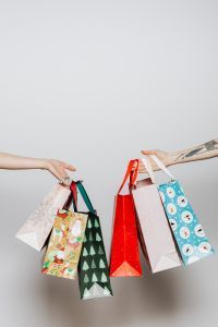 Kaboompics - Hands holding gift bags