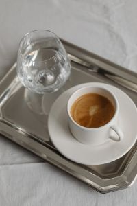 Kaboompics - Sleek Simplicity - Espresso Coffee and Water on a Silver Tray