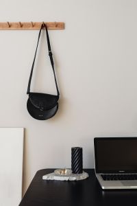 Kaboompics - Laptop - computer - desk - black candle - black leather bag