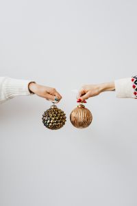 Kaboompics - Hand Holding Christmas Tree Baubles