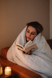 Kaboompics - A woman reads a book - reading