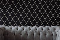 Kaboompics - Elegant grey sofa by the wall