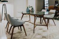 Kaboompics - Luxury dinning room interior, glass table, chairs, rug