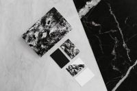 Kaboompics - Black & white mockup business brand template on marble background