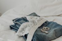 Kaboompics - White lace triangle top - jeans - silver earrings with cubic zirconia and pearl