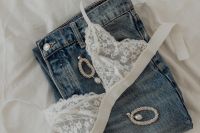 White lace triangle top - jeans - silver earrings with cubic zirconia and pearl