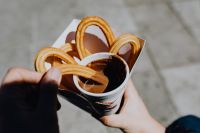 Kaboompics - Churros with a cup of hot chocolate