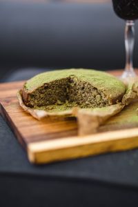 Kaboompics - Delicious homemade matcha cake on a wooden board