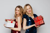 Kaboompics - Two Women in Green and Red Dress Holding a Gift
