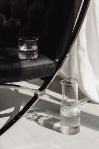 Kaboompics - Pure water - glass jug with a natural design - naturally shaped glass tumbler