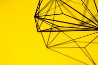 Kaboompics - Geometric decoration on yellow background