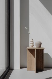 Kaboompics - Stoneware vase - ceramic - rounded shape - home decoration - book - window