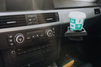 Kaboompics - Car ventilation system and air conditioning with coffee in handle, BMW E91 320d