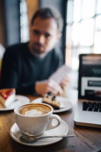 Kaboompics - Top View, Coffee with Heart Shape, cake, Macbook Laptop, Man