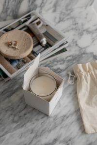 Elegant Aromatic Candle Unboxing on Marble Tabletop - UGC Style Interior Design